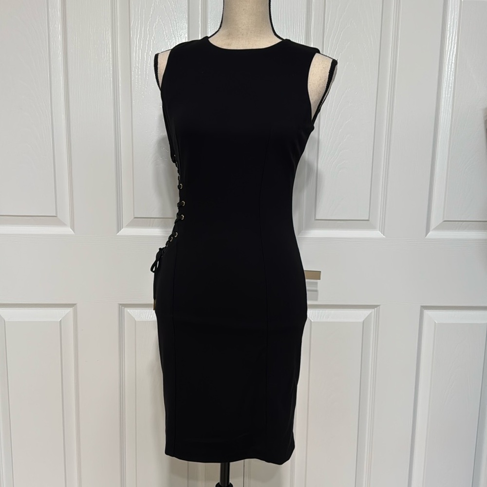 Black mini dress size small made in Italy.